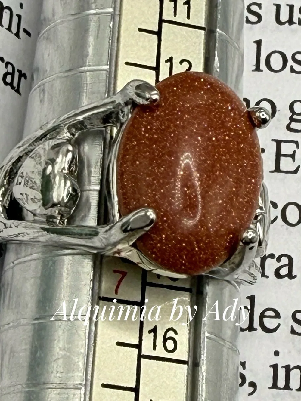 Sparkling Brown Goldstone Oval Ring in Silver-Tone Setting
